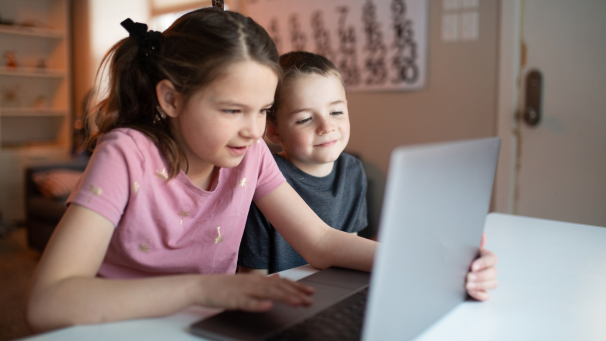 Image showing two children looking at a laptop