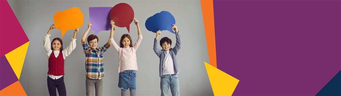 Image showing children holding up coloured speech bubbles